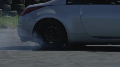 A Car Spins Out In A Parking Lot