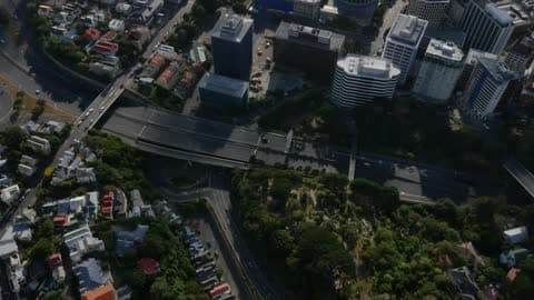Cars Travel Along Roads In An Urban Area
