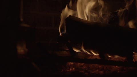 Close View Of Wood Burning In A Fireplace